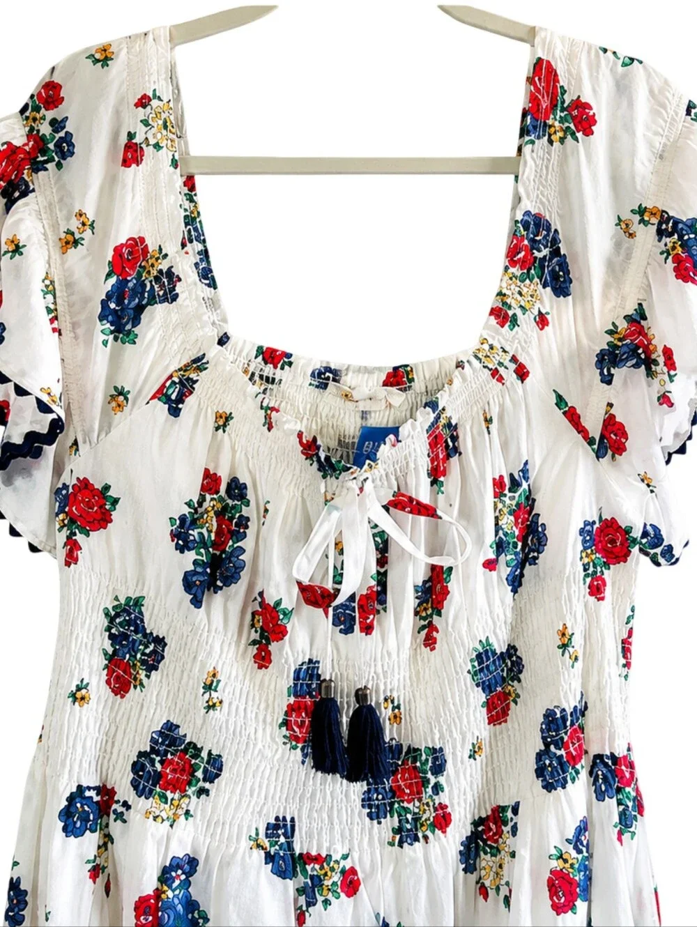 Tory Burch Meadow Folly Cotton Voile Midi Dress with a red and blue floral print